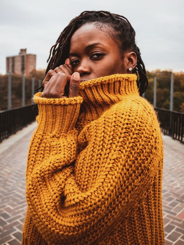 High neck drop hem sweater
